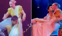 অনুমতি না নিয়েই স্টেজে নায়িকাকে বরুণের চুমু?